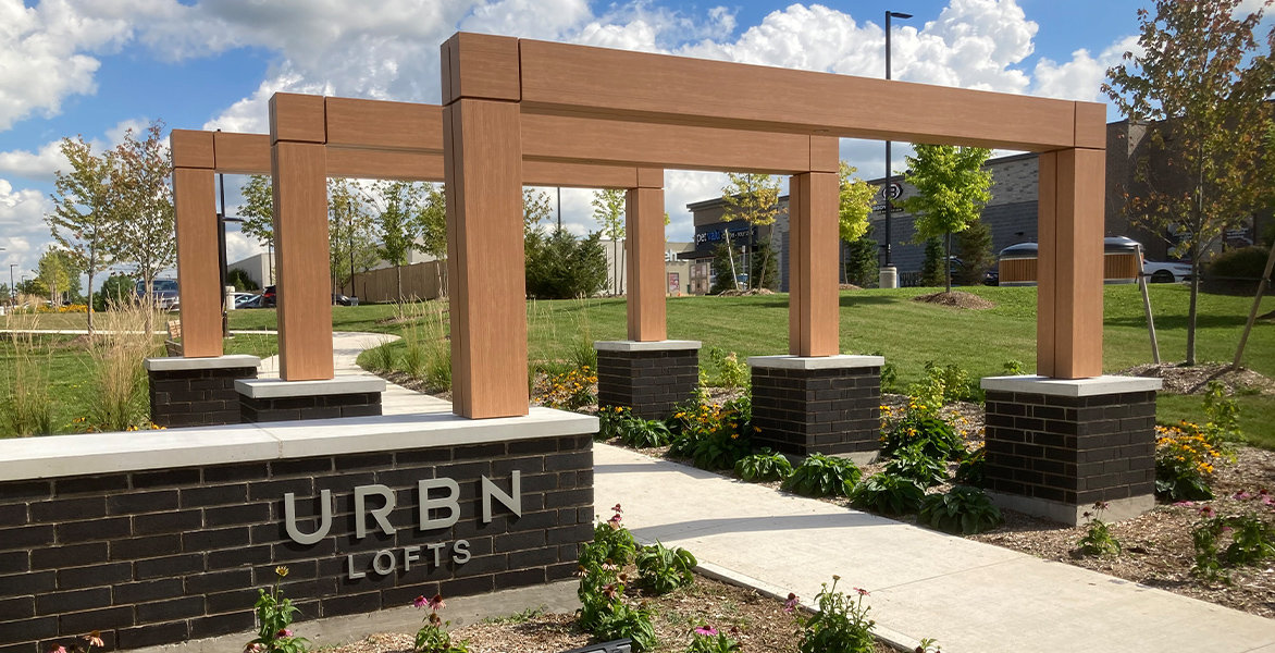 Wooden archways leading into a public park