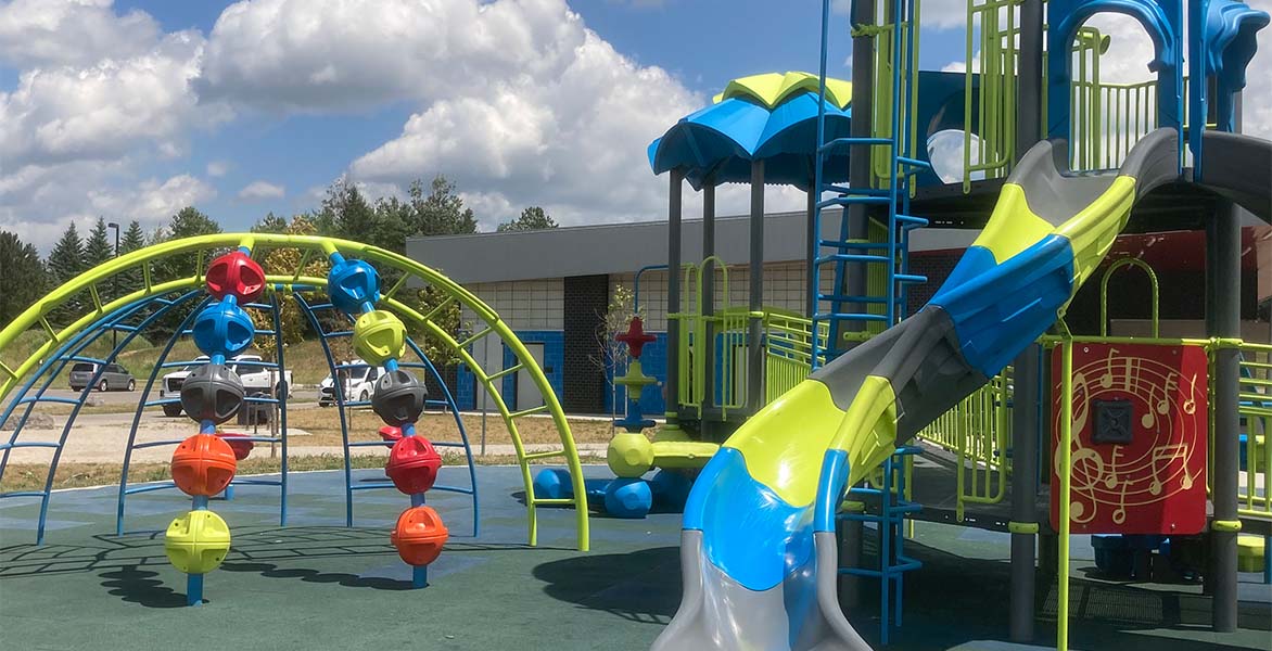 Bright green, blue red and orange playground 